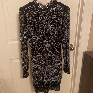 I’m selling a black sequin mini dress from Fashion Nova.